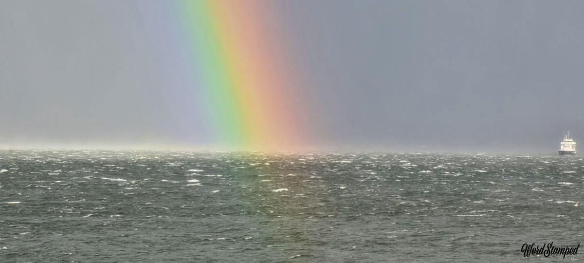 Rainbow on choppy sea